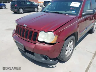 2009 Jeep Grand Cherokee Laredo with VIN 1J8GS48K39C521160, listed as a IAAI auction lot 42039577 with 262,829 mi miles. Bid and sale history available at carsss.com. Image 6.