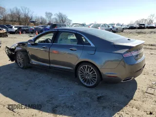 2015 Lincoln MKZ z VIN 3LN6L2JK1FR604092, wystawiony jako Copart lot #48379525 z przebiegiem 64 656 mil mil oraz Szkoda całkowita • Salvage title. Historia ofert i sprzedaży dostępna na DreamBid. Obrazek 2.