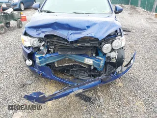 2013 Chevrolet Sonic LT with VIN 1G1JC5SH9D4251652, listed as a IAAI auction lot 41795018 with 45,268 mi miles and . Bid and sale history available at DreamBid. Image 6.