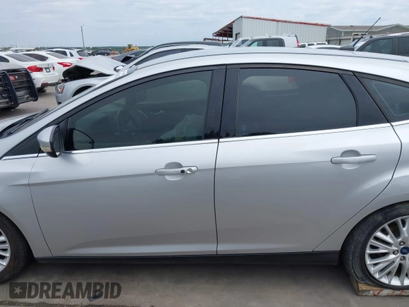 2015 Ford Focus Titanium with VIN 1FADP3N23FL356822, listed as a IAAI auction lot 41981053 with 115,584 mi miles and . Bid and sale history available at DreamBid. Image 15.