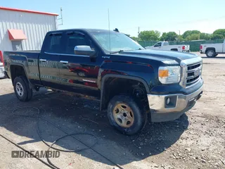 2015 GMC Sierra 1500 SLE with VIN 1GTV2UEC1FZ158720, listed as a IAAI auction lot 42279844 with 166,083 mi miles and . Bid and sale history available at DreamBid. Image 1.