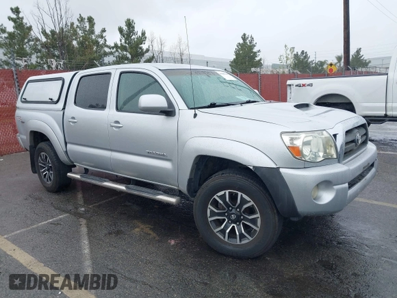 2007 Toyota Tacoma z VIN 3TMLU42N77M009397, wystawiony jako IAAI lot #41805139 z przebiegiem 256 744 mil mil oraz . Historia ofert i sprzedaży dostępna na DreamBid. Obrazek 1.
