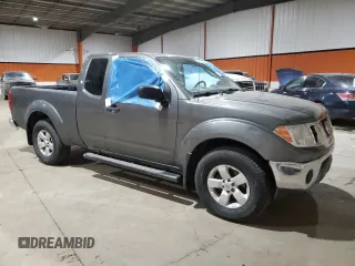 2009 Nissan Frontier SE with VIN 1N6AD06W49C406313, listed as a Copart auction lot 75226554 with 236,606 mi miles and Salvage title. Bid and sale history available at DreamBid. Image 4.