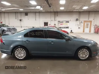 2012 Ford Fusion Hybrid z VIN 3FADP0L31CR443545, wystawiony jako IAAI lot #42028774 z przebiegiem 194 365 mil mil oraz . Historia ofert i sprzedaży dostępna na DreamBid. Obrazek 13.