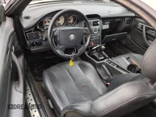 1999 Mercedes-Benz SLK-Class with VIN WDBKK47F5XF094256, listed as a Copart auction lot 75080164 with 0 mi miles and Salvage Title. Bid and sale history available at carsss.com. Image 8.