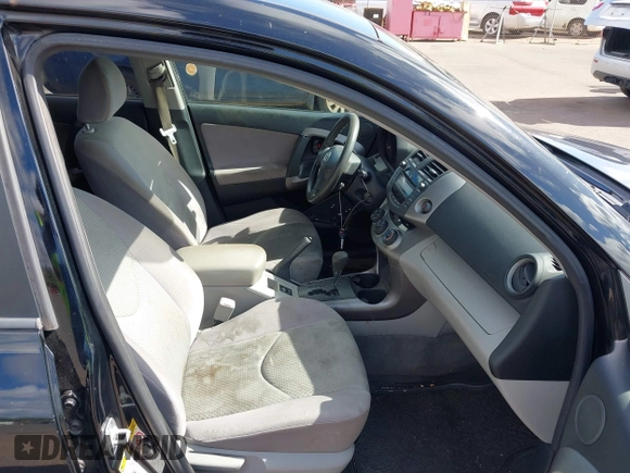 2008 Toyota RAV4 with VIN JTMBD33V986063323, listed as a IAAI auction lot 42025044 with 163,785 mi miles. Bid and sale history available at carsss.com. Image 5.