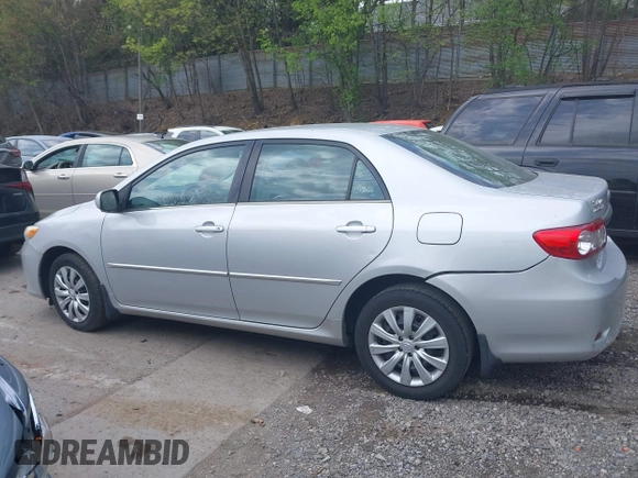 2013 Toyota Corolla L with VIN 2T1BU4EEXDC052854, listed as a IAAI auction lot 42230118 with 156,120 mi miles and . Bid and sale history available at DreamBid. Image 14.