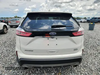 2020 Ford Edge SEL с VIN 2FMPK3J95LBA94317, выставлен на аукционе Copart как лот 62389575 с пробегом 38 523 миль миль и Списание • Salvage title. История ставок и продаж доступна на DreamBid. Изображение 6.