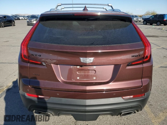 2023 Cadillac XT4 AWD Luxury with VIN 1GYFZBR42PF107893, listed as a Copart auction lot 74989124 with 9,579 mi miles and Salvage Title. Bid and sale history available at carsss.com. Image 6.