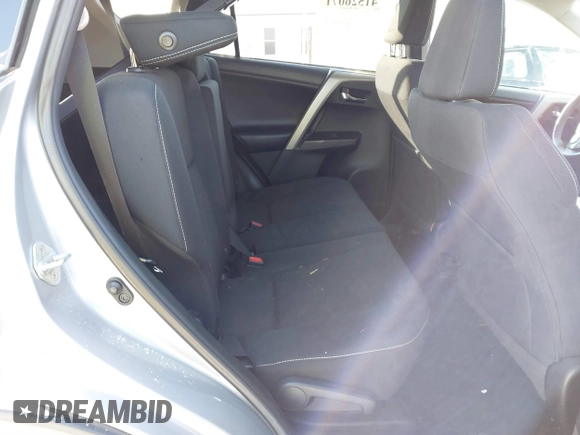 2018 Toyota RAV4 XLE with VIN 2T3RFREV8JW753853, listed as a IAAI auction lot 41526071 with 104,642 mi miles. Bid and sale history available at carsss.com. Image 8.