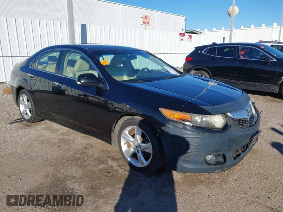 2010 Acura TSX with VIN JH4CU2F61AC041244, listed as a IAAI auction lot 41232564 with 82,604 mi miles. Bid and sale history available at carsss.com. Image 1.
