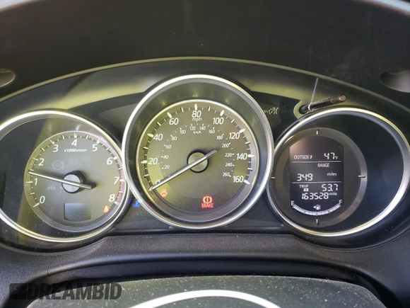 2016 Mazda CX-5 Sport with VIN JM3KE2BE9G0650543, listed as a Copart auction lot 41987795 with 163,528 mi miles and Salvage Title. Bid and sale history available at carsss.com. Image 9.