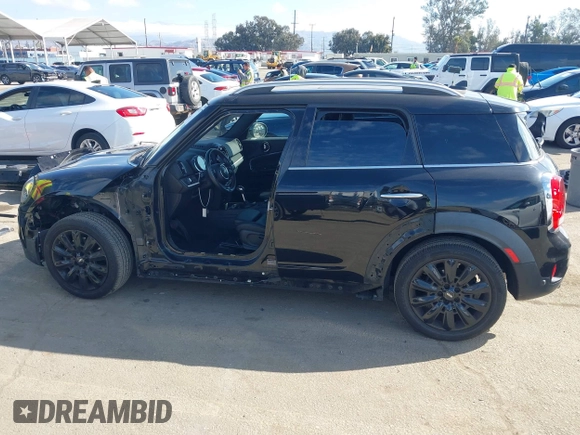 2019 MINI Countryman Cooper S z VIN WMZYT3C53K3J32447, wystawiony jako IAAI lot #41480577 z przebiegiem 43 948 mil mil oraz . Historia ofert i sprzedaży dostępna na DreamBid. Obrazek 15.