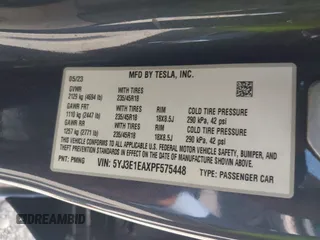 2023 Tesla Model 3 with VIN 5YJ3E1EAXPF575448, listed as a IAAI auction lot 42019288 with 33,859 mi miles and . Bid and sale history available at carsss.com. Image 9.