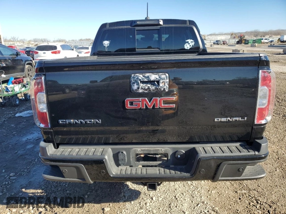2020 GMC Canyon 4WD Denali with VIN 1GTG6EEN2L1131363, listed as a Copart auction lot 83033354 with 52,694 mi miles and Salvage Title. Bid and sale history available at carsss.com. Image 6.