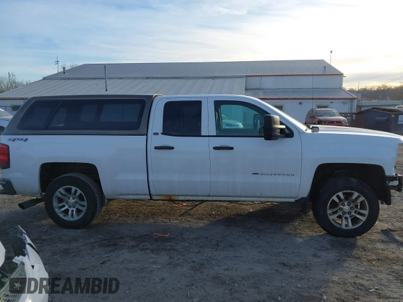 2014 Chevrolet Silverado 1500 LT with VIN 1GCVKREC2EZ361322, listed as a IAAI auction lot 41362836 with 199,684 mi miles and . Bid and sale history available at DreamBid. Image 14.