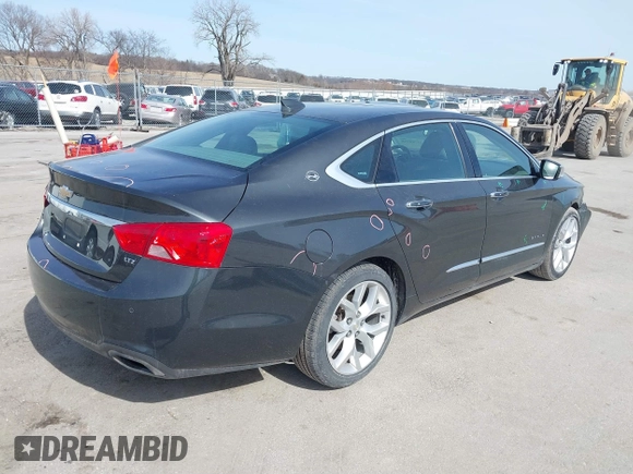 2015 Chevrolet Impala LTZ with VIN 1G1165S39FU138640, listed as a IAAI auction lot 41780288 with 145,000 mi miles and . Bid and sale history available at DreamBid. Image 21.