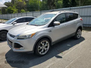 2013 Ford Escape Titanium z VIN 1FMCU0J96DUB50607, wystawiony jako Copart lot #55999745 z przebiegiem 177 798 mil mil oraz Tytuł czysty. Historia ofert i sprzedaży dostępna na DreamBid. Obrazek 1.