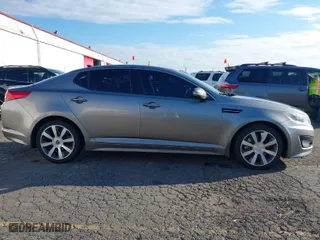 2013 Kia Optima SX w/Limited Pkg with VIN 5XXGR4A69DG190125, listed as a IAAI auction lot 41424498 with 134,056 mi miles. Bid and sale history available at carsss.com. Image 13.