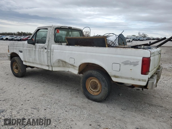 1993 Ford F-250 with VIN 1FTHF26H5PNA11633, listed as a Copart auction lot 79482634 with 186,709 mi miles and Salvage Title. Bid and sale history available at carsss.com. Image 2.