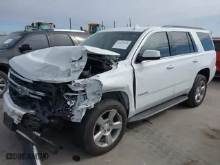 2018 Chevrolet Tahoe LT with VIN 1GNSCBKC0JR193421, listed as a IAAI auction lot 41241454 with 115,663 mi miles. Bid and sale history available at carsss.com. Image 2.