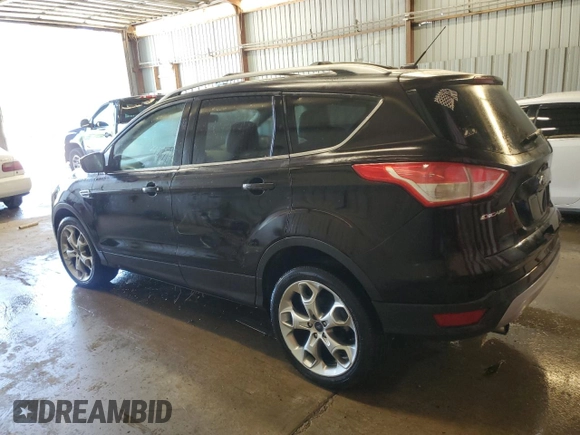 2013 Ford Escape Titanium z VIN 1FMCU9J90DUA98718, wystawiony jako Copart lot #63683005 z przebiegiem 101 036 mil mil oraz Czysty tytuł • Clean title. Historia ofert i sprzedaży dostępna na DreamBid. Obrazek 2.