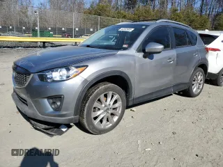 2015 Mazda CX-5 Grand Touring with VIN JM3KE4DY5F0460465, listed as a Copart auction lot 46392605 with 103,185 mi miles and Salvage Title. Bid and sale history available at carsss.com. Image 1.