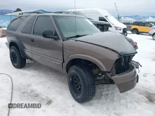1998 Chevrolet Blazer LS with VIN 1GNCT18W9WK123061, listed as a IAAI auction lot 41295379 with Not provided miles and . Bid and sale history available at DreamBid. Image 1.