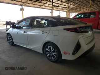 2017 Toyota Prius Plus z VIN JTDKARFP9H3028985, wystawiony jako Copart lot #57596735 z przebiegiem 89 031 mil mil oraz Szkody całkowita. Historia ofert i sprzedaży dostępna na DreamBid. Obrazek 2.