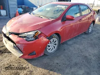 2019 Toyota Corolla L z VIN 5YFBURHE9KP859016, wystawiony jako Copart lot #85894214 z przebiegiem 80 691 mil mil oraz Czysty tytuł • Clean title. Historia ofert i sprzedaży dostępna na DreamBid. Obrazek 1.
