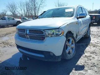 2013 Dodge Durango Citadel z VIN 1C4RDJEG6DC638023, wystawiony jako IAAI lot #41761307 z przebiegiem 405 864 mil mil oraz . Historia ofert i sprzedaży dostępna na DreamBid. Obrazek 17.