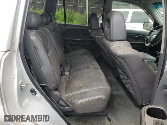 2003 Honda Pilot EX z VIN 2HKYF18763H581343, wystawiony jako Copart lot #60804525 z przebiegiem 236 636 mil mil oraz Szkoda całkowita • Salvage title. Historia ofert i sprzedaży dostępna na DreamBid. Obrazek 11.