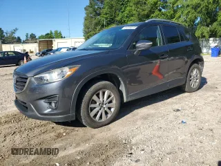 2016 Mazda CX-5 Touring с VIN JM3KE2CY6G0812024, выставлен на аукционе Copart как лот 61229515 с пробегом 106 105 миль миль и Списание • Salvage title. История ставок и продаж доступна на DreamBid. Изображение 1.