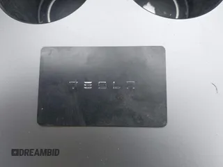 2021 Tesla Model Y Long Range with VIN 5YJYGAEE1MF149887, listed as a IAAI auction lot 42032104 with 54,932 mi miles. Bid and sale history available at carsss.com. Image 11.