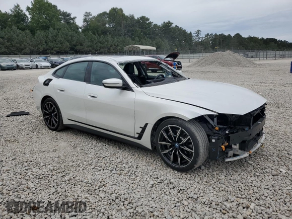 2024 BMW i4 eDrive40 z VIN WBY73AW07RFR74988, wystawiony jako Copart lot #70713824 z przebiegiem 14 117 mil mil oraz Szkody całkowita. Historia ofert i sprzedaży dostępna na DreamBid. Obrazek 4.