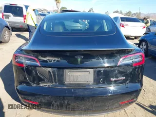 2021 Tesla Model 3 Performance with VIN 5YJ3E1EC6MF999321, listed as a IAAI auction lot 41417451 with 20,562 mi miles and . Bid and sale history available at carsss.com. Image 16.