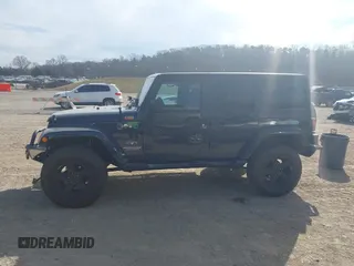 2017 Jeep Wrangler Unlimited Sahara with VIN 1C4BJWEG6HL735431, listed as a IAAI auction lot 41700357 with 100,035 mi miles. Bid and sale history available at carsss.com. Image 14.