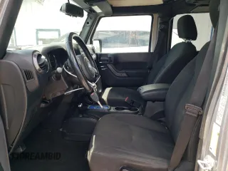 2018 Jeep Wrangler JK Unlimited Sport S with VIN 1C4BJWDG3JL926795, listed as a Copart auction lot 55535224 with 53,377 mi miles and Salvage Title. Bid and sale history available at carsss.com. Image 7.