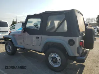 2000 Jeep Wrangler SE with VIN 1J4FA29P3YP770094, listed as a Copart auction lot 65419385 with 150,364 mi miles and Clean title. Bid and sale history available at DreamBid. Image 2.