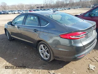 2018 Ford Fusion SE z VIN 3FA6P0HD7JR211569, wystawiony jako IAAI lot #41792146 z przebiegiem 187 505 mil mil oraz . Historia ofert i sprzedaży dostępna na DreamBid. Obrazek 3.