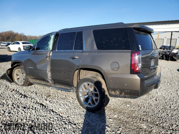 2015 GMC Yukon SLT with VIN 1GKS1BKC8FR664001, listed as a Copart auction lot 84391784 with 0 mi miles and Salvage Title. Bid and sale history available at carsss.com. Image 2.