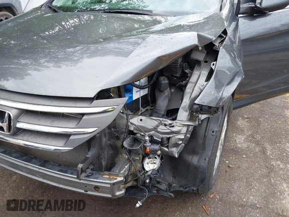 2013 Honda CR-V EX z VIN 2HKRM4H58DH656443, wystawiony jako IAAI lot #42348940 z przebiegiem 79 477 mil mil oraz . Historia ofert i sprzedaży dostępna na DreamBid. Obrazek 18.