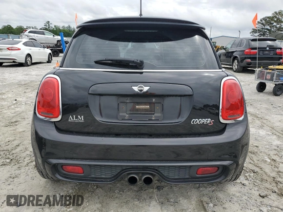 2015 MINI Hardtop S z VIN WMWXP7C51F2A33449, wystawiony jako Copart lot #55553455 z przebiegiem 77 577 mil mil oraz Szkoda całkowita • Salvage title. Historia ofert i sprzedaży dostępna na DreamBid. Obrazek 6.