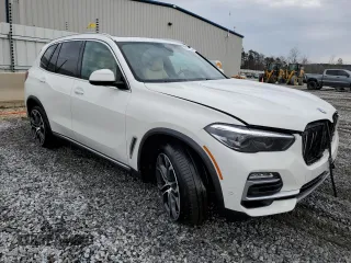 2021 BMW X5 sDrive40i with VIN 5UXCR4C04M9E30879, listed as a Copart auction lot 39577953 with 19,276 mi miles. Bid and sale history available at carsss.com. Image 4.
