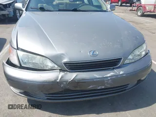 1998 Lexus ES 300 with VIN JT8BF28G3W5031533, listed as a IAAI auction lot 42132801 with 243,178 mi miles and . Bid and sale history available at DreamBid. Image 6.