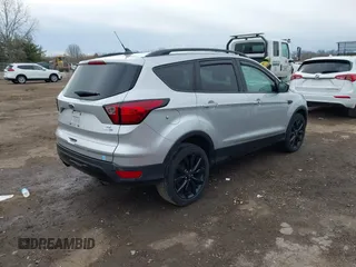 2019 Ford Escape SE with VIN 1FMCU9GD7KUB29309, listed as a IAAI auction lot 41876535 with 90,688 mi miles. Bid and sale history available at carsss.com. Image 4.