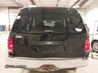 2001 Ford Explorer Sport z VIN 1FMYU60E71UA76200, wystawiony jako IAAI lot #41358321 z przebiegiem 118 134 mil mil oraz . Historia ofert i sprzedaży dostępna na DreamBid. Obrazek 17.