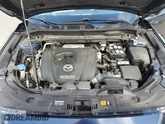 2018 Mazda CX-5 Grand Touring with VIN JM3KFADMXJ1353942, listed as a Copart auction lot 60570835 with 74,400 mi miles and Clean title. Bid and sale history available at DreamBid. Image 12.