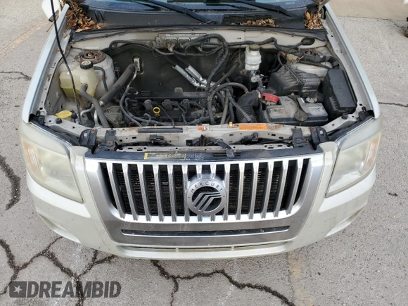 2009 Mercury Mariner Premier z VIN 4M2CU87739KJ21572, wystawiony jako Copart lot #83665504 z przebiegiem 181 858 mil mil oraz Szkoda całkowita • Salvage title. Historia ofert i sprzedaży dostępna na DreamBid. Obrazek 12.
