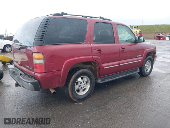 2002 Chevrolet Tahoe LS with VIN 1GNEK13T92J312155, listed as a IAAI auction lot 41580792 with 338,511 mi miles and . Bid and sale history available at DreamBid. Image 4.